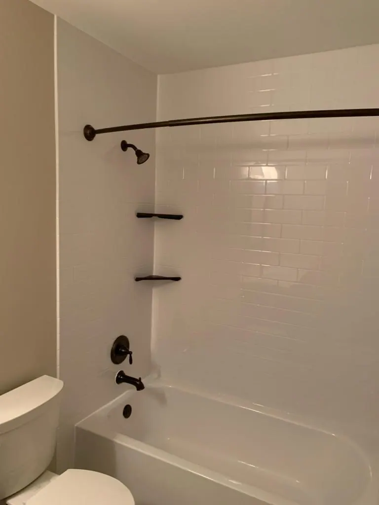 Finished tub and shower with a solid-surface surround, an Excel install in Chicagoland's south suburbs