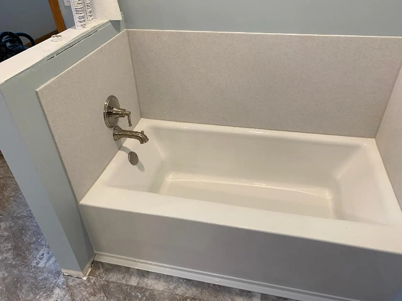 Finished tub and shower with a solid-surface surround, an Excel install in Chicagoland's south suburbs
