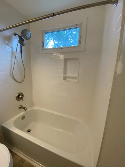 Finished tub and shower with a solid-surface surround, an Excel install in Chicagoland's south suburbs