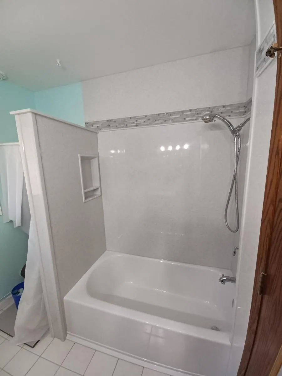 Finished tub and shower with a solid-surface surround, an Excel install in Chicagoland's south suburbs