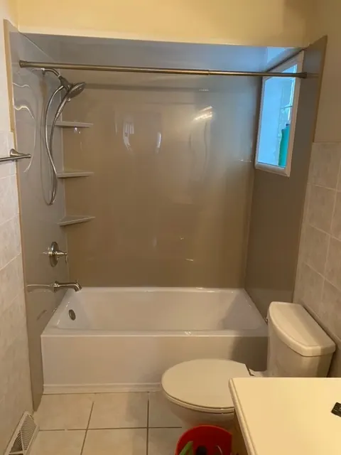 Finished tub and shower with a solid-surface surround, an Excel install in Chicagoland's south suburbs