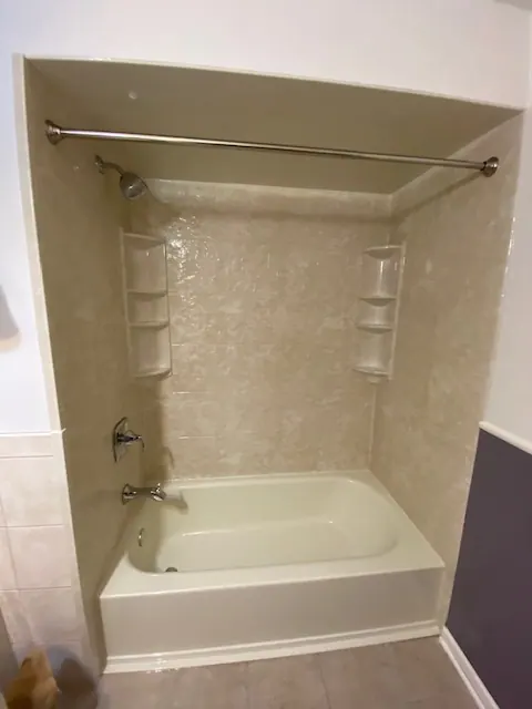 Finished tub and shower with a solid-surface surround, an Excel install in Chicagoland's south suburbs