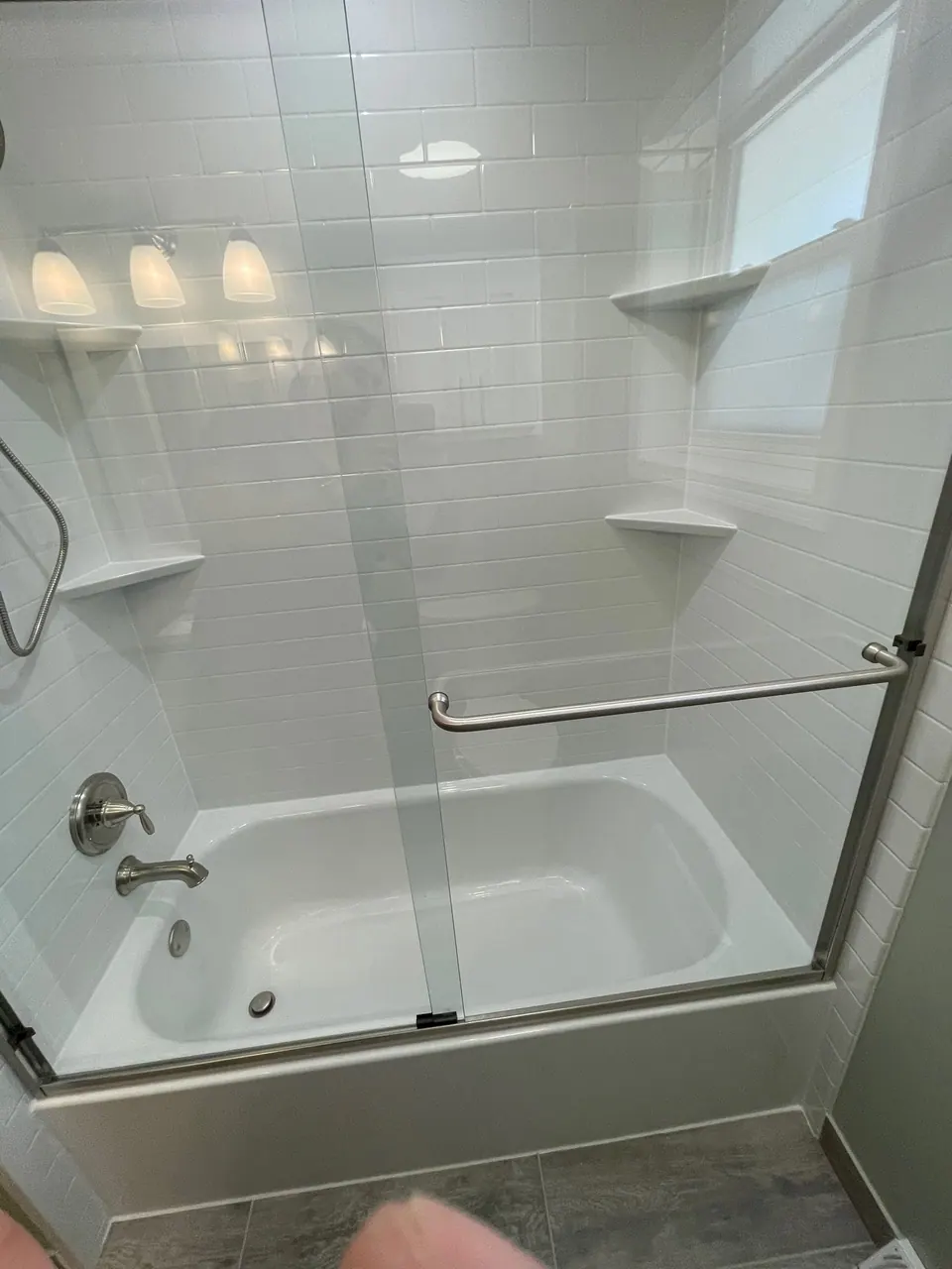 Finished tub and shower with a solid-surface surround, an Excel install in Chicagoland's south suburbs