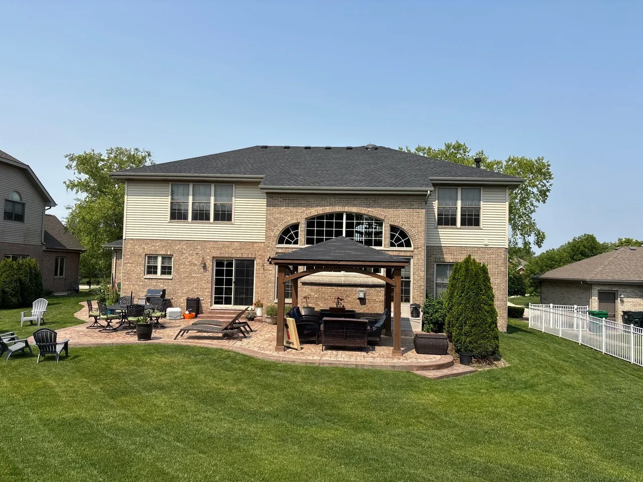 Finished asphalt-shingle roof — rear elevation with patio, Chicagoland south suburbs