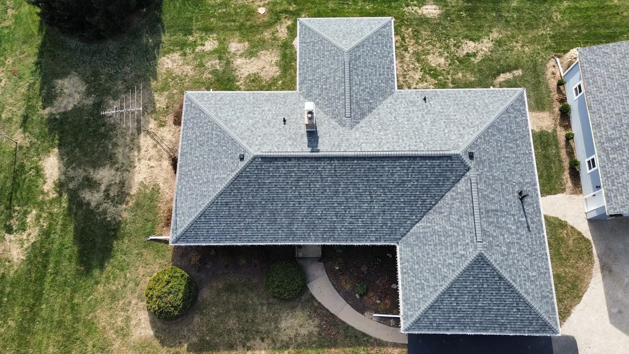 Aerial of a new hip-roof asphalt-shingle installation, Chicagoland