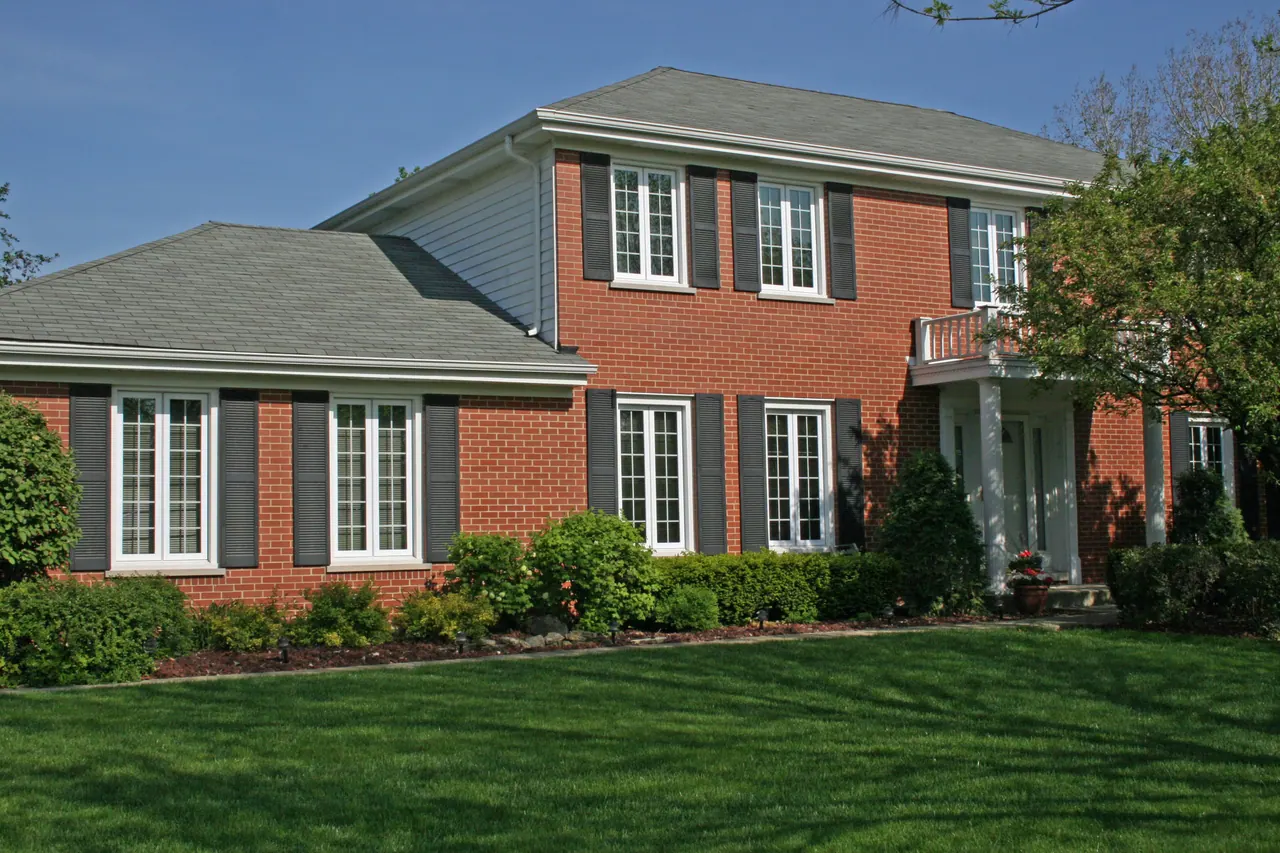 Double-hung windows on a south-suburb home