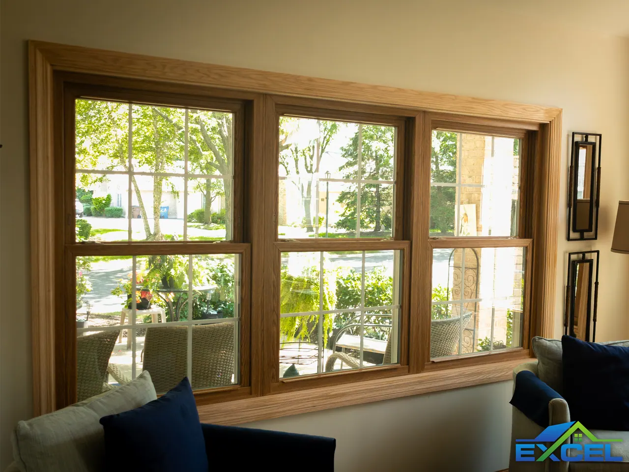 Oak-trimmed triple double-hung windows, side view