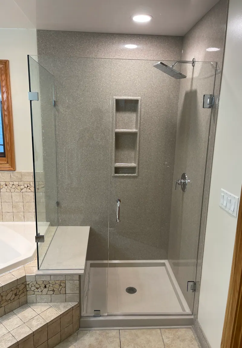 Walk-in shower with solid-surface walls