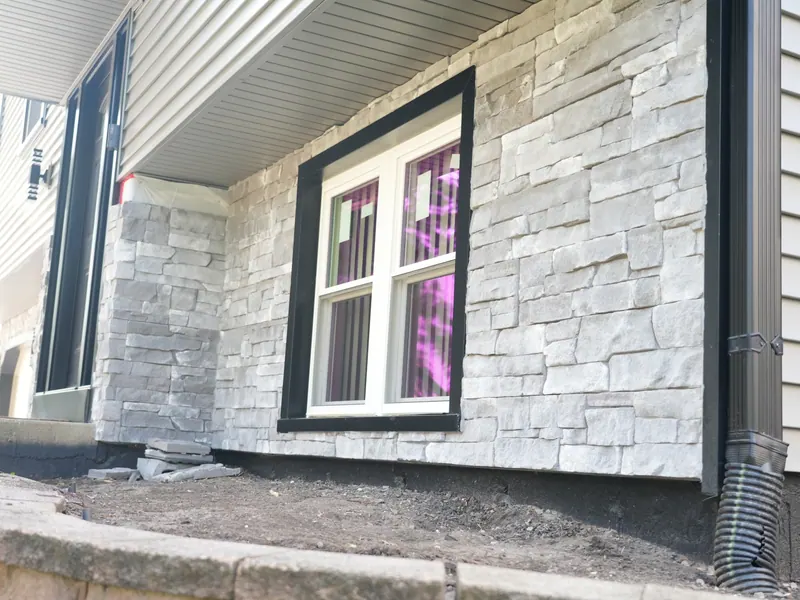 New engineered-wood siding on a Chicagoland home — an Excel install