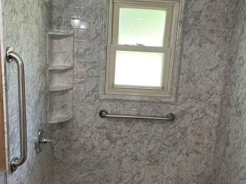 Tub-to-shower conversion