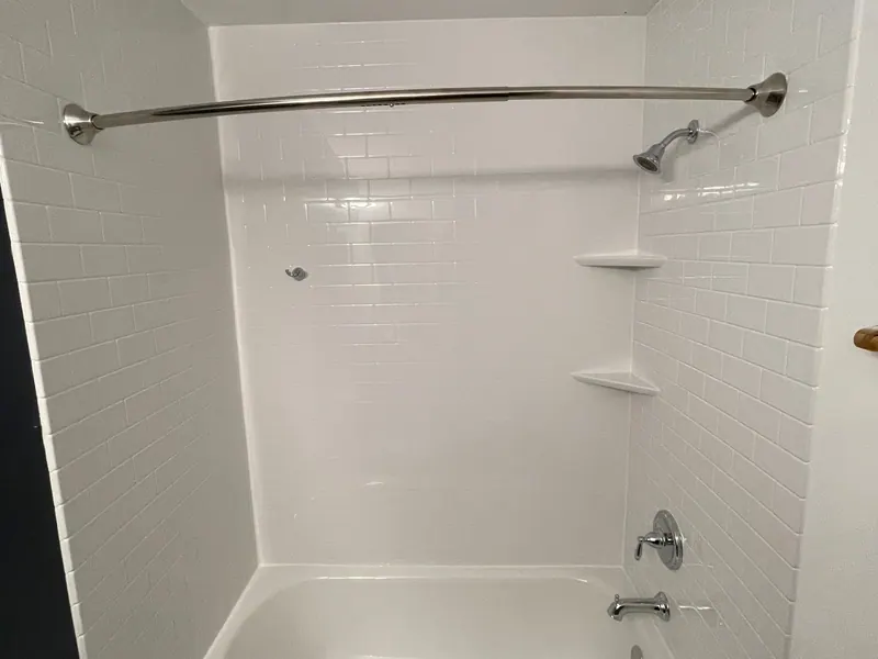 Tub-to-shower conversion